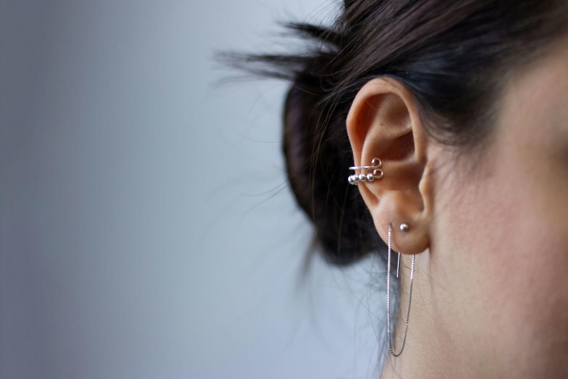 A hole in the ear symbolizing spiritual perception and sensitivity Photo - A hole in the ear symbolizing spiritual perception and sensitivity